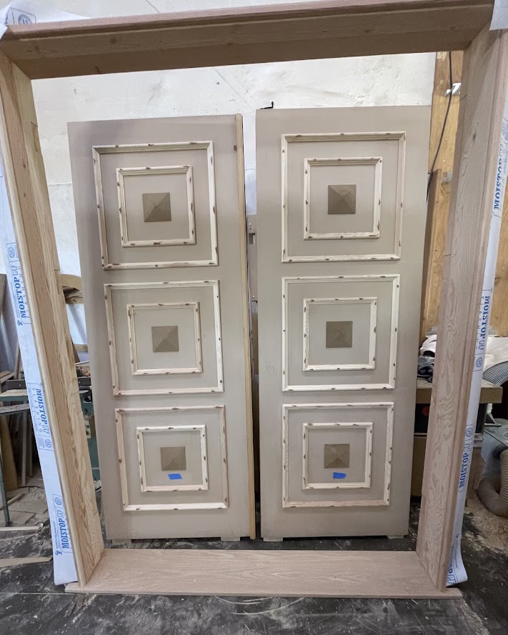 Custom double doors with pyramid panels built for a Los Feliz home