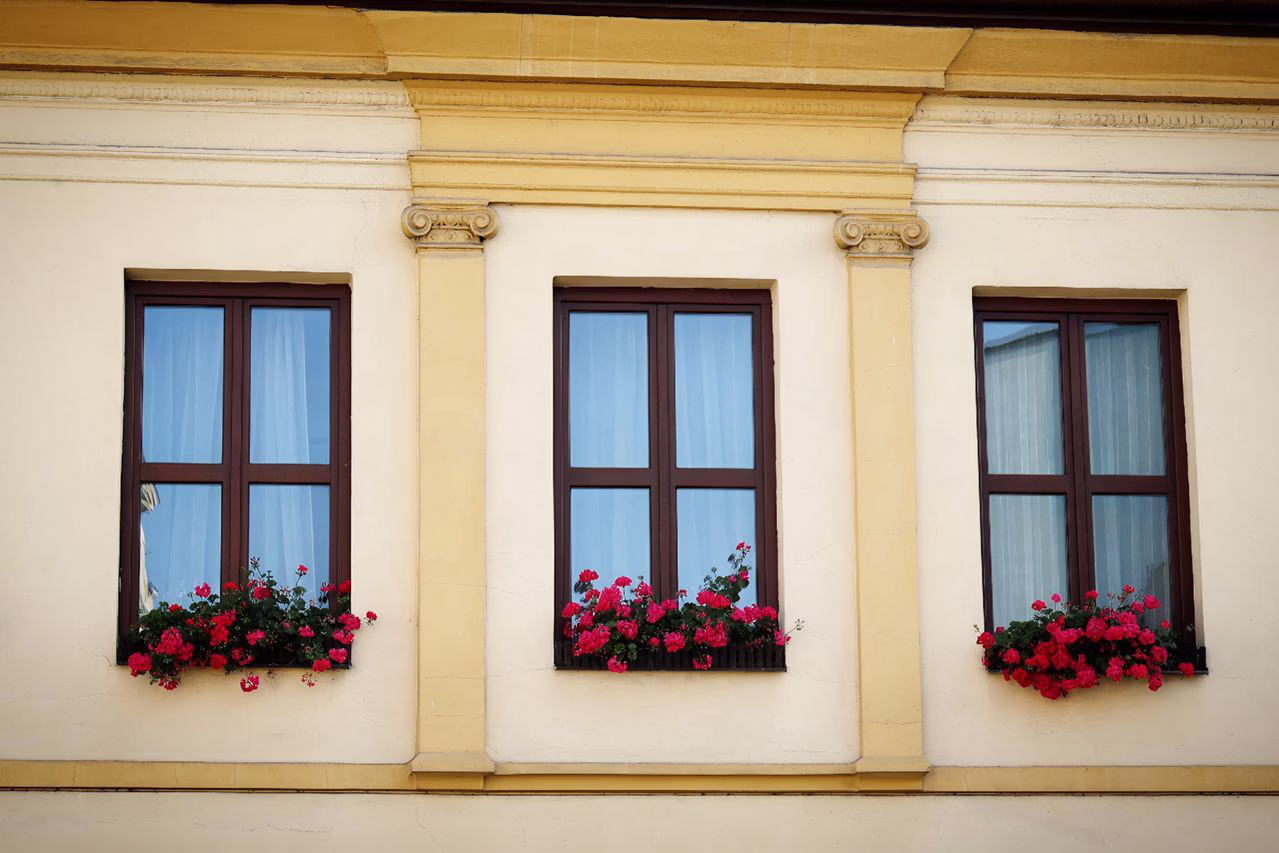 Spanish Revival wood windows with flower boxes on a Los Feliz home