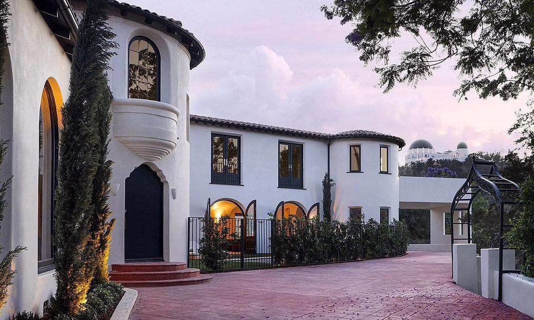 Spanish Colonial home in Los Feliz with the Griffith Observatory in the background